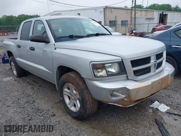 ✅ 2010 Dodge Dakota Bighorn/Lonestar • VIN: 1D7CW3GK4AS140049 • Lot: 42231805. Wystawiony na IAAI z przebiegiem 149 489 mil. Bezpłatny archiwum sprzedaży aukcyjnych z USA i szczegółowy raport historii pojazdu na DreamBid. Zdjęcie 1.