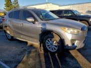 ✅ 2014 Mazda CX-5 Sport • VIN: JM3KE2BE5E0379221 • Lot: 96541255. Listed on Copart with 216,899 mi. Free auction sales archive from the USA and detailed vehicle history report at DreamBid. Image 4.