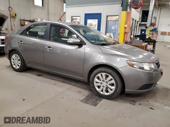 ✅ 2010 Kia Forte EX • VIN: KNAFU4A25A5858085 • Лот: 81429145. Опубликован ранее на Copart с пробегом 197 972 миль. Бесплатный доступ к архиву аукционных продаж из США и подробный отчёт об истории автомобиля на DreamBid. Изображение 4.