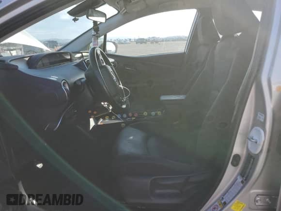 2021 Toyota Prius LE z VIN JTDKAMFP6M3174337, wystawiony jako Copart lot #81413265 z przebiegiem 142 475 mil mil oraz Szkoda całkowita • Salvage title. Historia ofert i sprzedaży dostępna na DreamBid. Obrazek 7.