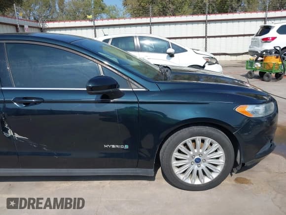 ✅ 2014 Ford Fusion S Hybrid • VIN: 3FA6P0UU7ER167858 • Lot: 43504447. Listed on IAAI with 190,194 mi. Free auction sales archive from the USA and detailed vehicle history report at DreamBid. Image 17.