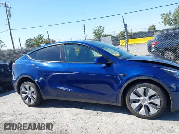 ✅ 2023 Tesla Model Y Long Range • VIN: 7SAYGDEE3PF816547 • Lot: 42383050. Listed on IAAI with 20,917 mi. Free auction sales archive from the USA and detailed vehicle history report at DreamBid. Image 13.