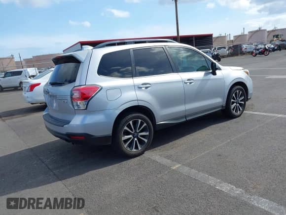 2017 Subaru Forester Premium with VIN JF2SJGEC2HH546296, listed as a IAAI auction lot 42410718 with 140,647 mi miles and . Bid and sale history available at DreamBid. Image 4.