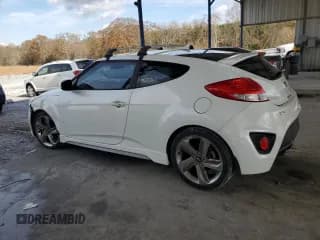 ✅ 2014 Hyundai Veloster Turbo • VIN: KMHTC6AE5EU183148 • Lot: 84218904. Wystawiony na Copart z przebiegiem 96 211 mil. Bezpłatny archiwum sprzedaży aukcyjnych z USA i szczegółowy raport historii pojazdu na DreamBid. Zdjęcie 2.