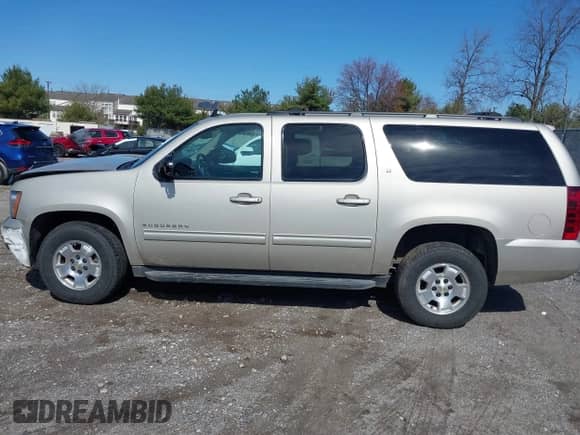 2014 Chevrolet Suburban LT z VIN 1GNSKJE71ER145069, wystawiony jako IAAI lot #41855455 z przebiegiem 197 617 mil mil oraz . Historia ofert i sprzedaży dostępna na DreamBid. Obrazek 14.