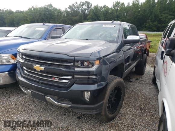 ✅ 2018 Chevrolet Silverado 1500 • VIN: TNV1N230158399080 • Лот: 63489073. Опубликован ранее на Copart с пробегом 80 942 миль. Бесплатный доступ к архиву аукционных продаж из США и подробный отчёт об истории автомобиля на DreamBid. Изображение 2.