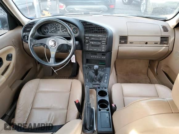 1996 BMW 3 Series z VIN 4USCD7322TLC50315, wystawiony jako Copart lot #87952885 z przebiegiem 318 396 mil mil oraz Szkoda całkowita • Salvage title. Historia ofert i sprzedaży dostępna na DreamBid. Obrazek 8.