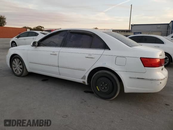 ✅ 2009 Hyundai Sonata Limited • VIN: 5NPEU46C79H486115 • Лот: 83515624. Опубликован ранее на Copart с пробегом 192 548 миль. Бесплатный доступ к архиву аукционных продаж из США и подробный отчёт об истории автомобиля на DreamBid. Изображение 2.