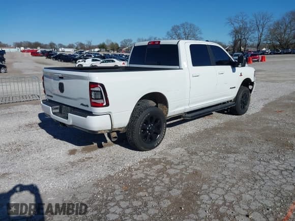 ✅ 2023 Ram 2500 Laramie • VIN: 3C6UR5FLXPG590582 • Lot: 41684629. Listed on IAAI with 17,304 mi. Free auction sales archive from the USA and detailed vehicle history report at DreamBid. Image 4.