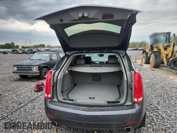 ✅ 2012 Cadillac SRX Performance Collection • VIN: 3GYFNBE30CS598950 • Lot: 81205505. Listed on Copart with 96,413 mi. Free auction sales archive from the USA and detailed vehicle history report at DreamBid. Image 6.