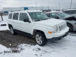 ✅ 2014 Jeep Patriot Latitude • VIN: 1C4NJRFB7ED897883 • Lot: 43846250. Listed on IAAI with 159,065 mi. Free auction sales archive from the USA and detailed vehicle history report at DreamBid. Image 1.