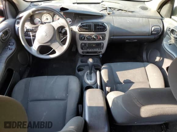 2005 Dodge Neon SXT z VIN 1B3ES56C45D236652, wystawiony jako Copart lot #64765865 z przebiegiem 74 373 mil mil oraz Czysty tytuł • Clean title. Historia ofert i sprzedaży dostępna na DreamBid. Obrazek 8.