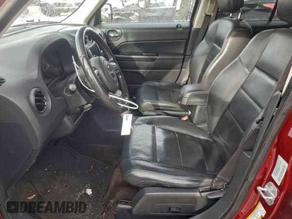 ✅ 2015 Jeep Patriot Latitude • VIN: 1C4NJRFB3FD292891 • Lot: 94342795. Listed on Copart with 129,549 mi. Free auction sales archive from the USA and detailed vehicle history report at DreamBid. Image 7.