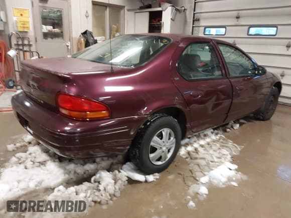 ✅ 2000 Dodge Stratus SE • VIN: 1B3EJ46X5YN155058 • Lot: 43867718. Listed on IAAI with 84,502 mi. Free auction sales archive from the USA and detailed vehicle history report at DreamBid. Image 4.