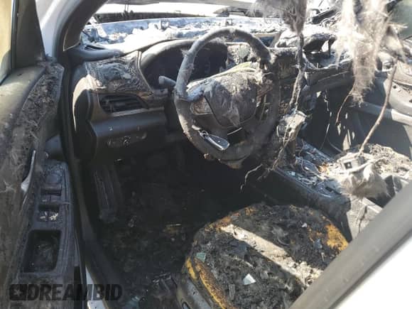 2019 Chevrolet Traverse LT Cloth z VIN 1GNERGKW8KJ121675, wystawiony jako Copart lot #84051555 z przebiegiem Nie podano mil oraz Nie do naprawy • Non repairable. Historia ofert i sprzedaży dostępna na DreamBid. Obrazek 8.