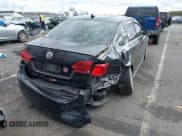 ✅ 2014 Volkswagen Jetta GLI • VIN: 3VW5T7AJ6EM258246 • Lot: 43543504. Listed on IAAI with 124,950 mi. Free auction sales archive from the USA and detailed vehicle history report at DreamBid. Image 4.