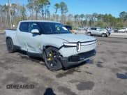 ✅ 2024 Rivian R1T Adventure • VIN: 7FCTGAAA5RN033799 • Лот: 41606562. Опубликован ранее на IAAI с пробегом 9 449 миль. Бесплатный доступ к архиву аукционных продаж из США и подробный отчёт об истории автомобиля на DreamBid. Изображение 1.