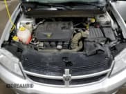 ✅ 2010 Dodge Avenger SXT • VIN: 1B3CC4FB1AN169194 • Лот: 80318604. Опубликован ранее на Copart с пробегом 106 184 миль. Бесплатный доступ к архиву аукционных продаж из США и подробный отчёт об истории автомобиля на DreamBid. Изображение 11.