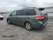 ✅ 2012 Toyota Sienna LE AAS • VIN: 5TDKK3DC5CS199833 • Lot: 65168885. Listed on Copart with 128,047 mi. Free auction sales archive from the USA and detailed vehicle history report at DreamBid. Image 2.