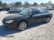 ✅ 2003 Ford Taurus SE Standard • VIN: 1FAFP53U93G179724 • Lot: 84913265. Wystawiony na Copart z przebiegiem 92 731 mil. Bezpłatny archiwum sprzedaży aukcyjnych z USA i szczegółowy raport historii pojazdu na DreamBid. Zdjęcie 1.