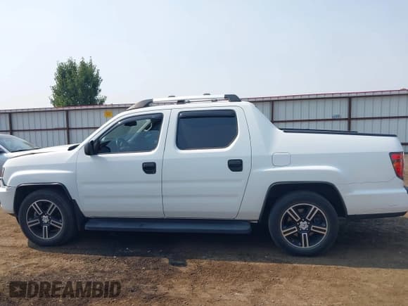 ✅ 2014 Honda Ridgeline Sport • VIN: 5FPYK1F76EB014797 • Лот: 43151556. Опубликован ранее на IAAI с пробегом 94 345 миль. Бесплатный доступ к архиву аукционных продаж из США и подробный отчёт об истории автомобиля на DreamBid. Изображение 14.