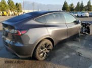 ✅ 2025 Tesla Model Y Long Range • VIN: 7SAYGDEE2SF248557 • Лот: 84877515. Опубликован ранее на Copart с пробегом Не указан. Бесплатный доступ к архиву аукционных продаж из США и подробный отчёт об истории автомобиля на DreamBid. Изображение 3.