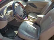 ✅ 2003 Ford Mustang Deluxe • VIN: 1FAFP44413F386140 • Lot: 85580595. Listed on Copart with 96,580 mi. Free auction sales archive from the USA and detailed vehicle history report at DreamBid. Image 7.