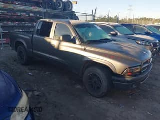 ✅ 2003 Dodge Dakota Sport • VIN: 1D7HL38NX3S190271 • Lot: 41264054. Wystawiony na IAAI z przebiegiem 139 498 mil. Bezpłatny archiwum sprzedaży aukcyjnych z USA i szczegółowy raport historii pojazdu na DreamBid. Zdjęcie 1.