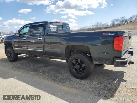 ✅ 2017 Chevrolet Silverado 1500 • VIN: 100000000016199W1 • Лот: 47011105. Опубликован ранее на Copart с пробегом 128 779 миль. Бесплатный доступ к архиву аукционных продаж из США и подробный отчёт об истории автомобиля на DreamBid. Изображение 2.