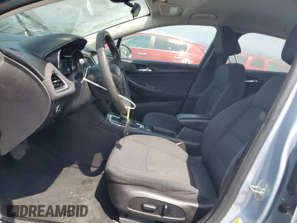 ✅ 2018 Chevrolet Cruze LT • VIN: 1G1BE5SM2J7114834 • Lot: 80557205. Listed on Copart with 131,256 mi. Free auction sales archive from the USA and detailed vehicle history report at DreamBid. Image 7.
