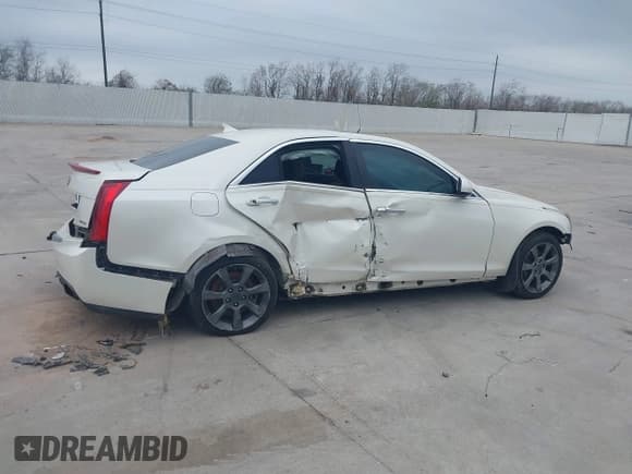 ✅ 2013 Cadillac ATS • VIN: 1G6AG5RX3D0138802 • Lot: 41192671. Listed on IAAI with 77,130 mi. Free auction sales archive from the USA and detailed vehicle history report at DreamBid. Image 13.