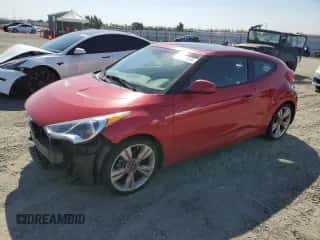 ✅ 2013 Hyundai Veloster w/Gray Int • VIN: KMHTC6AD9DU092793 • Лот: 69122514. Размещён на Copart с пробегом 75 920 миль миль. Получите бесплатный доступ к архиву аукционных продаж из США и посмотрите подробный отчёт об истории автомобиля на DreamBid. Изображение 1.