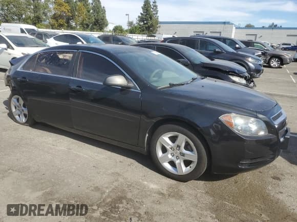 ✅ 2012 Chevrolet Malibu 1LS • VIN: 1G1ZB5E00CF209207 • Lot: 77158644. Listed on Copart with 107,161 mi. Free auction sales archive from the USA and detailed vehicle history report at DreamBid. Image 4.