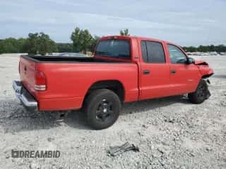 2001 Dodge Dakota Sport z VIN 1B7GL2AX51S193278, wystawiony jako Copart lot #70592784 z przebiegiem 252 944 mil mil oraz Szkoda całkowita • Salvage title. Historia ofert i sprzedaży dostępna na DreamBid. Obrazek 3.