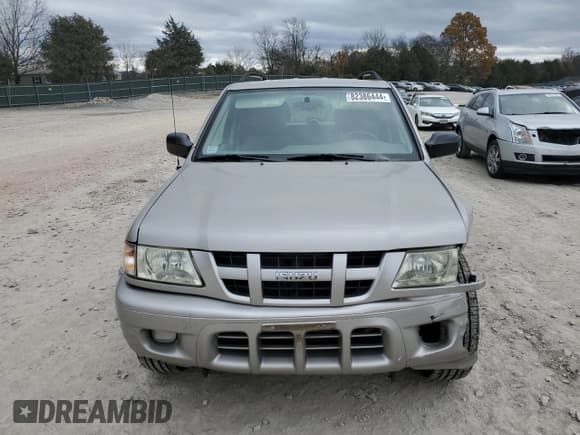 ✅ 2004 Isuzu Rodeo S • VIN: 4S2CK58Y744305349 • Lot: 82386444. Listed on Copart with 162,752 mi. Free auction sales archive from the USA and detailed vehicle history report at DreamBid. Image 4.
