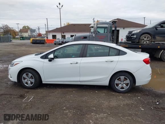 ✅ 2018 Chevrolet Cruze LS • VIN: 1G1BC5SM0J7218504 • Lot: 43614029. Listed on IAAI with 81,472 mi. Free auction sales archive from the USA and detailed vehicle history report at DreamBid. Image 14.