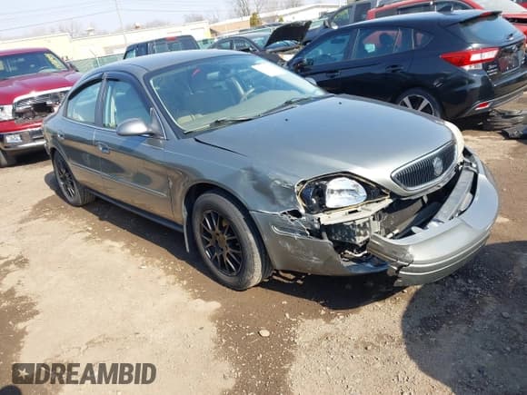 ✅ 2003 Mercury Sable GS • VIN: 1MEFM50243A619761 • Lot: 41790150. Listed on IAAI with 114,522 mi. Free auction sales archive from the USA and detailed vehicle history report at DreamBid. Image 1.