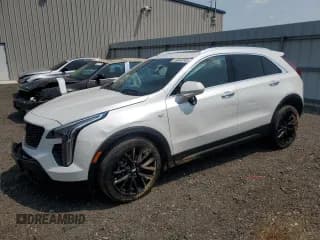 ✅ 2022 Cadillac XT4 FWD Luxury • VIN: 1GYAZAR48NF105566 • Lot: 96624255. Listed on Copart with 57,543 mi. Free auction sales archive from the USA and detailed vehicle history report at DreamBid. Image 1.