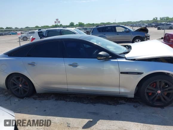 ✅ 2014 Jaguar XJ • VIN: SAJWA1CZXE8V59430 • Лот: 42252069. Опубликован ранее на IAAI с пробегом 87 150 миль. Бесплатный доступ к архиву аукционных продаж из США и подробный отчёт об истории автомобиля на DreamBid. Изображение 13.