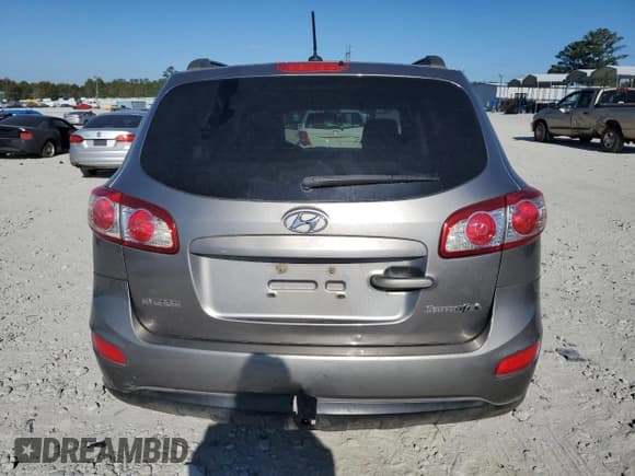 ✅ 2011 Hyundai Santa Fe GLS • VIN: 5XYZG3AB0BG005670 • Lot: 77069174. Listed on Copart with 238,635 mi. Free auction sales archive from the USA and detailed vehicle history report at DreamBid. Image 6.
