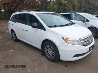 ✅ 2013 Honda Odyssey EX-L • VIN: 5FNRL5H66DB048193 • Lot: 43514565. Wystawiony na IAAI z przebiegiem 184 996 mil. Bezpłatny archiwum sprzedaży aukcyjnych z USA i szczegółowy raport historii pojazdu na DreamBid. Zdjęcie 1.