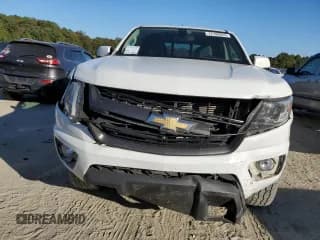 ✅ 2018 Chevrolet Colorado 4WD Z71 • VIN: 1GCPTDE12J1320964 • Лот: 74100024. Опубликован ранее на Copart с пробегом 105 929 миль. Бесплатный доступ к архиву аукционных продаж из США и подробный отчёт об истории автомобиля на DreamBid. Изображение 5.