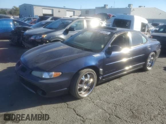 ✅ 2000 Pontiac Grand Prix GT • VIN: 1G2WP52K6YF289495 • Лот: 69342584. Опубликован ранее на Copart с пробегом 199 599 миль. Бесплатный доступ к архиву аукционных продаж из США и подробный отчёт об истории автомобиля на DreamBid. Изображение 1.