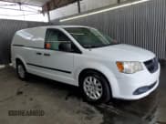 ✅ 2014 Ram Cargo Van Tradesman • VIN: 2C4JRGAG8ER428197 • Lot: 69726885. Listed on Copart with 174,129 mi. Free auction sales archive from the USA and detailed vehicle history report at DreamBid. Image 4.