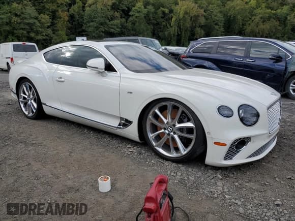 ✅ 2022 Bentley Continental GT GT V8 • VIN: SCBCG2ZG4NC096647 • Lot: 74068264. Listed on Copart with 14,666 mi. Free auction sales archive from the USA and detailed vehicle history report at DreamBid. Image 4.