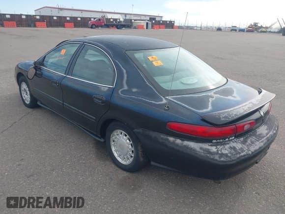 ✅ 1997 Mercury Sable GS • VIN: 1MELM50U5VA656308 • Lot: 41882560. Wystawiony na IAAI z przebiegiem 91 017 mil. Bezpłatny archiwum sprzedaży aukcyjnych z USA i szczegółowy raport historii pojazdu na DreamBid. Zdjęcie 3.