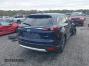 ✅ 2021 Mazda CX-9 Touring • VIN: JM3TCBCYXM0521709 • Lot: 43452547. Listed on IAAI with 50,115 mi. Free auction sales archive from the USA and detailed vehicle history report at DreamBid. Image 4.