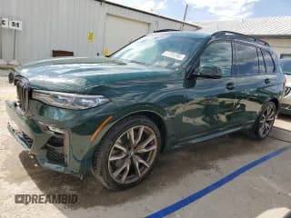 ✅ 2021 BMW X7 M50i • VIN: 5UXCX6C04M9G05701 • Lot: 57291295. Wystawiony na Copart z przebiegiem 27 263 mil. Bezpłatny archiwum sprzedaży aukcyjnych z USA i szczegółowy raport historii pojazdu na DreamBid. Zdjęcie 1.