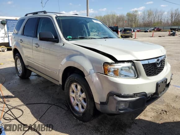 ✅ 2008 Mazda Tribute Grand Touring • VIN: 4F2CZ06128KM13900 • Lot: 51960155. Listed on Copart with 178,328 mi. Free auction sales archive from the USA and detailed vehicle history report at DreamBid. Image 4.