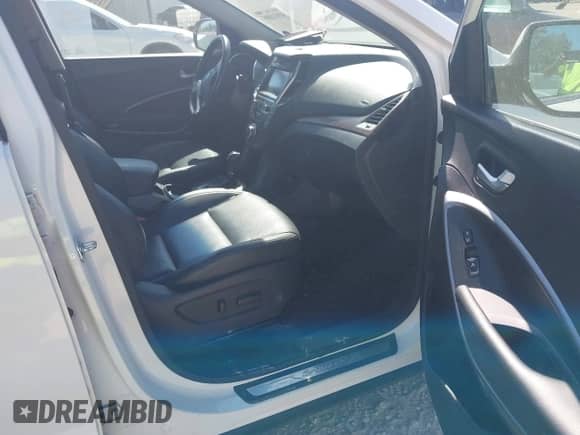 2017 Hyundai Santa Fe SE z VIN KM8SNDHF3HU224776, wystawiony jako IAAI lot #43111085 z przebiegiem Nie podano mil oraz . Historia ofert i sprzedaży dostępna na DreamBid. Obrazek 5.